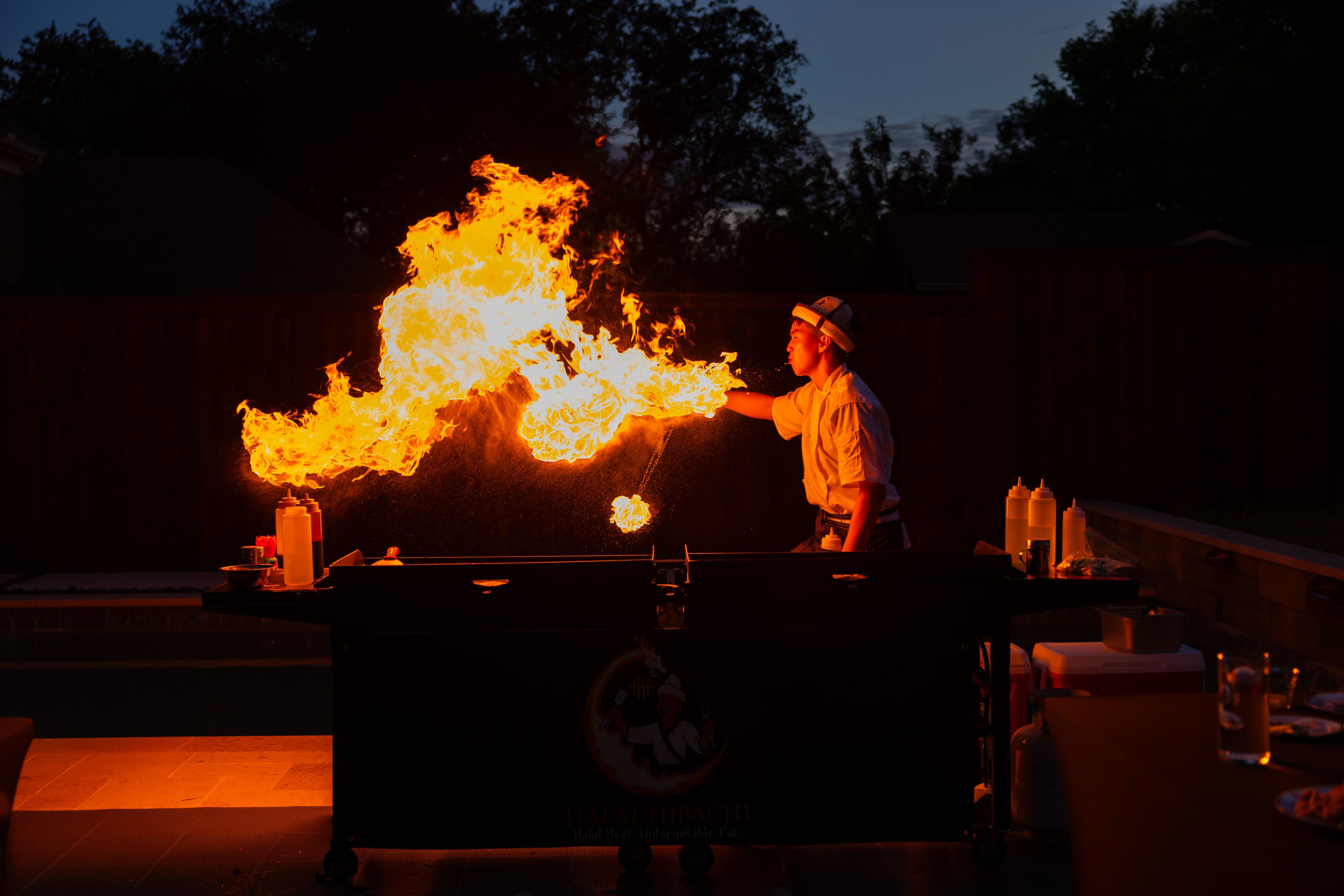 Professional hibachi chef in action