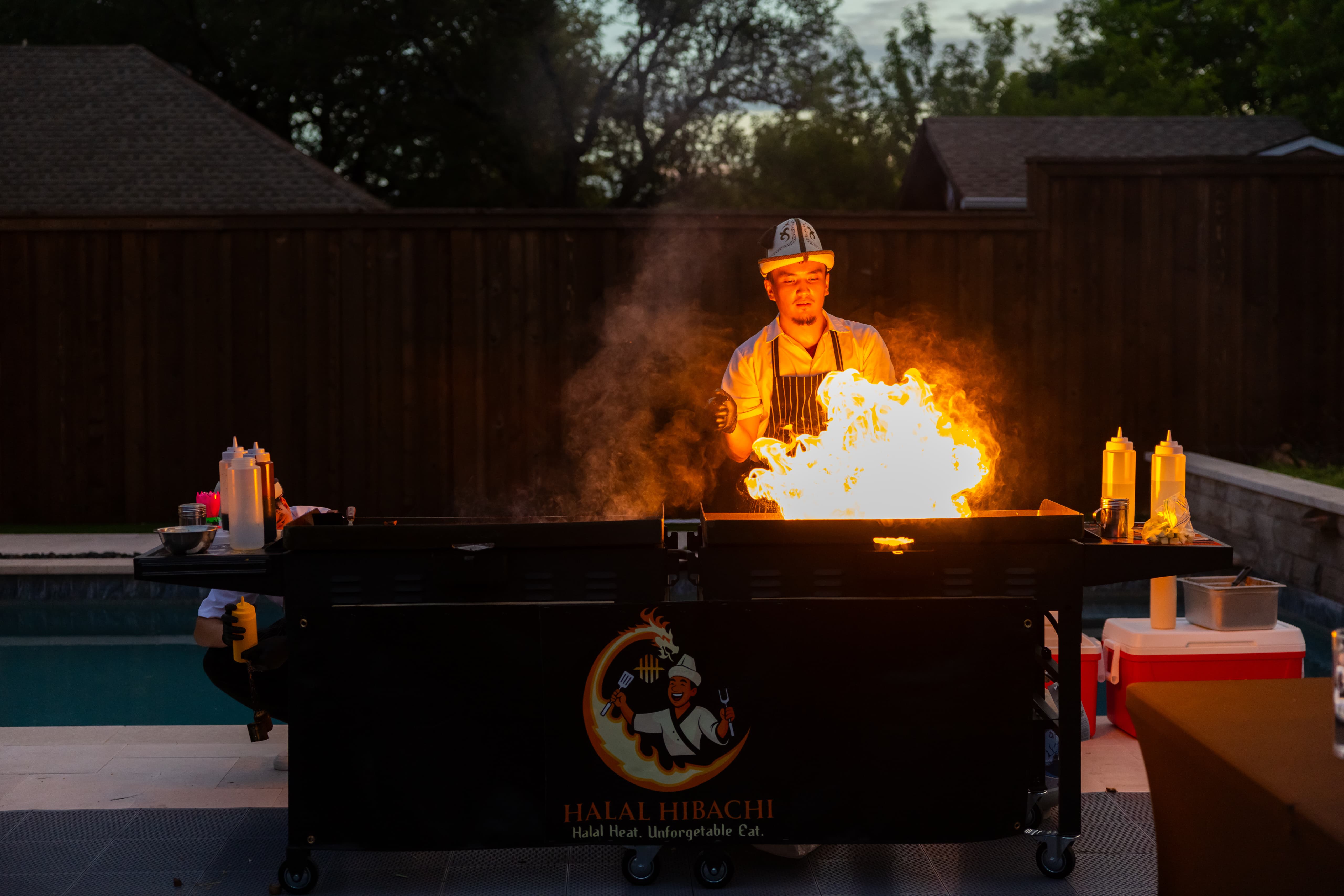 Chefs preparing hibachi entertainment for guests