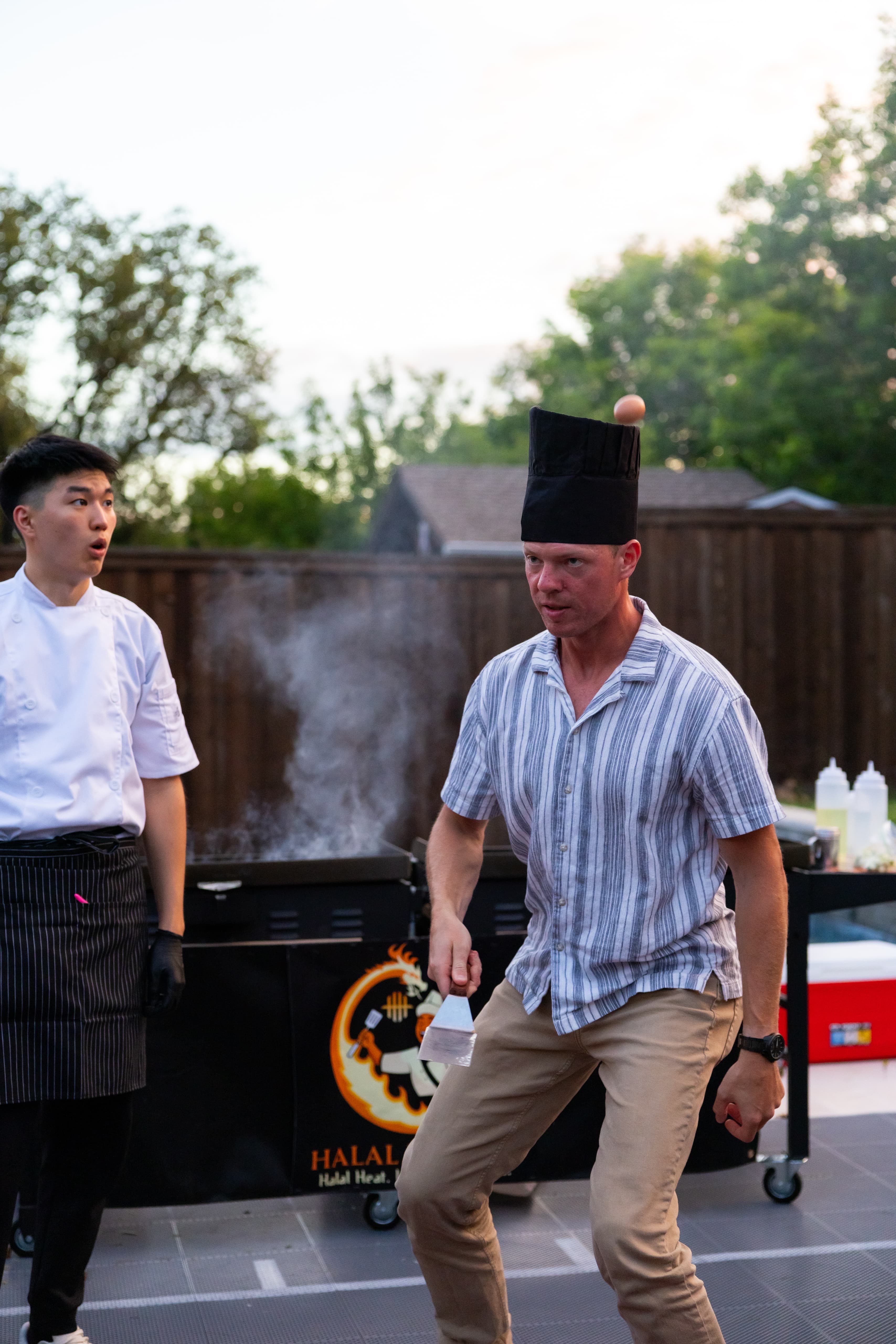 Interactive hibachi cooking demonstration with guests