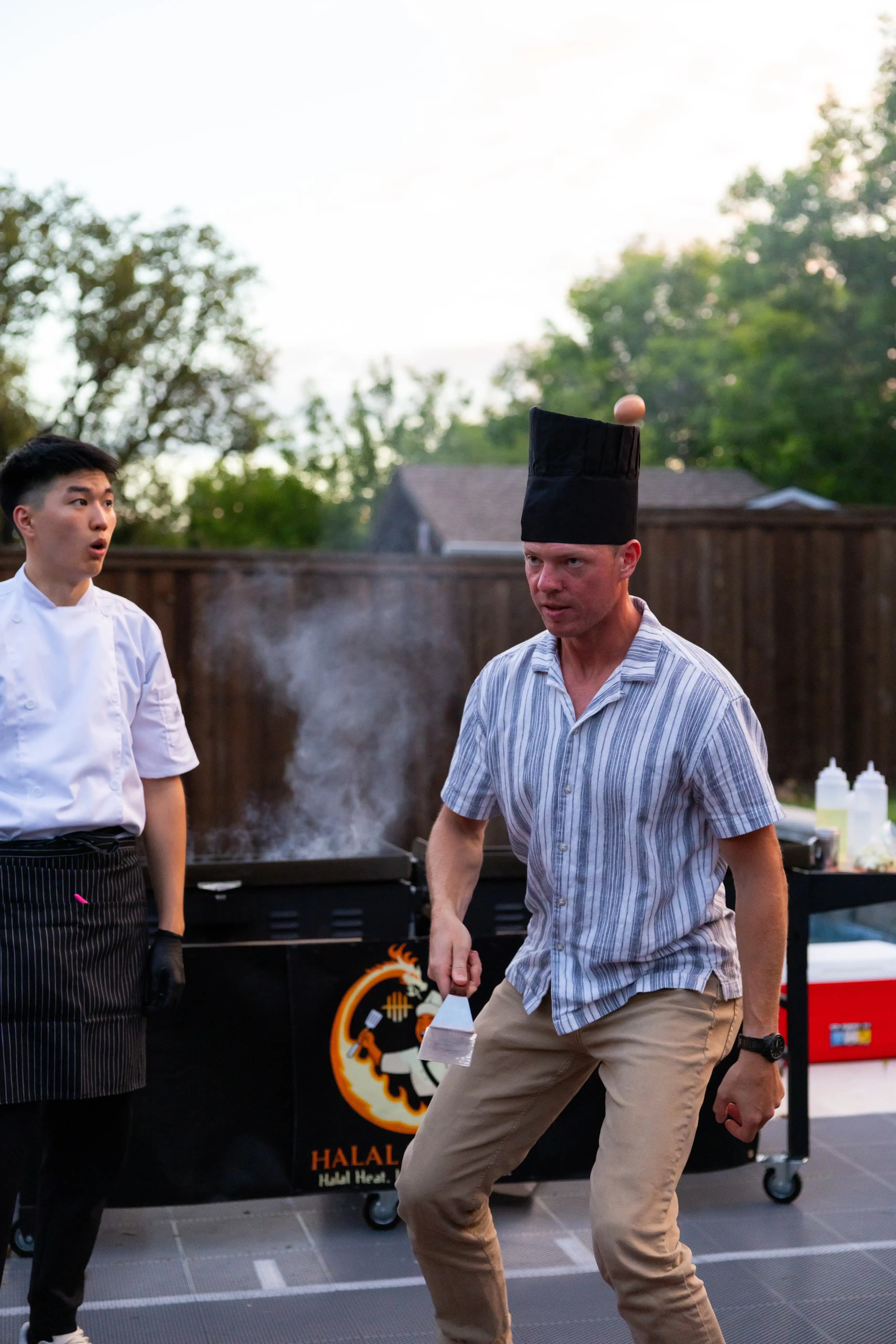 Interactive hibachi cooking demonstration with guests