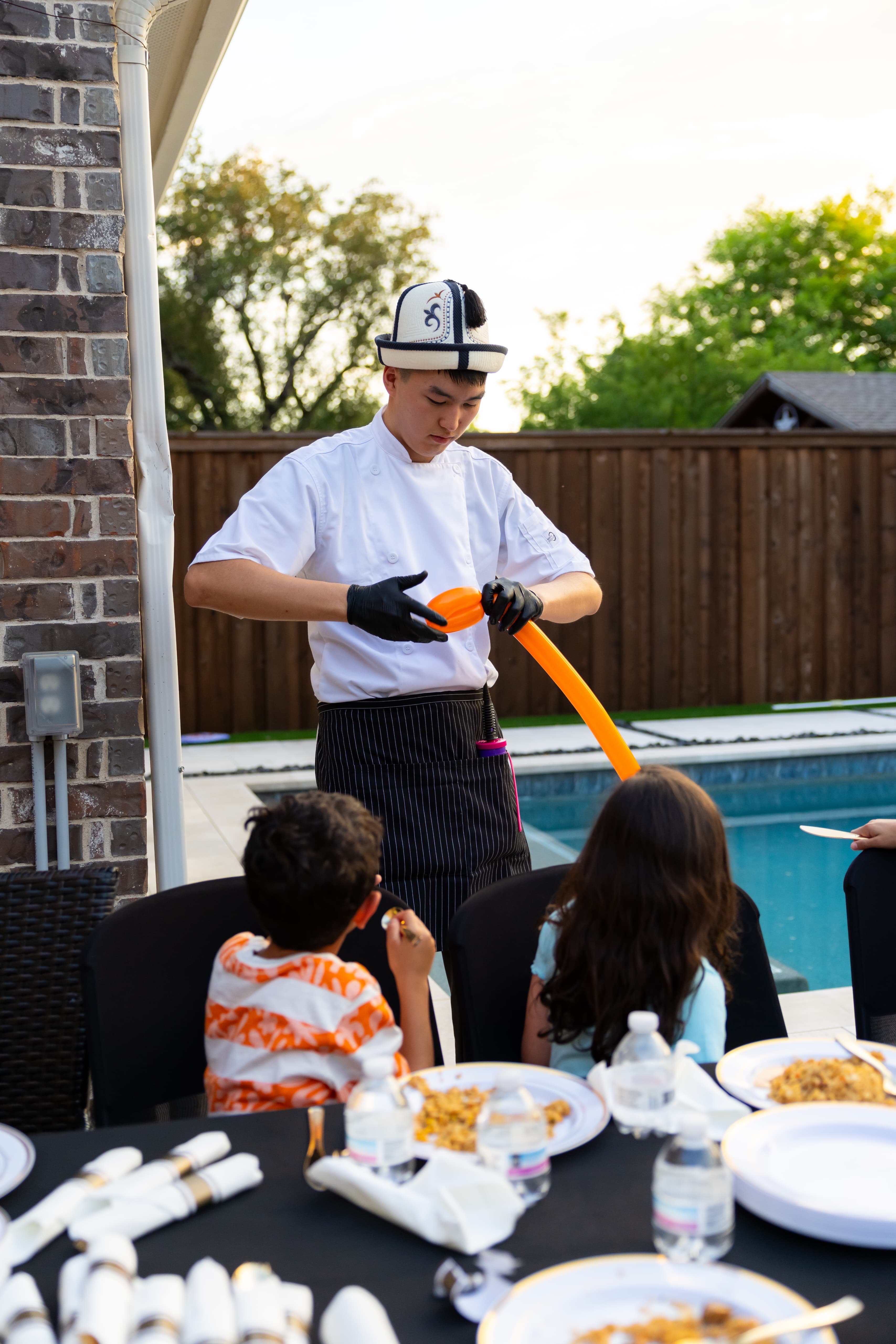 Master chef with traditional hibachi tools and equipment