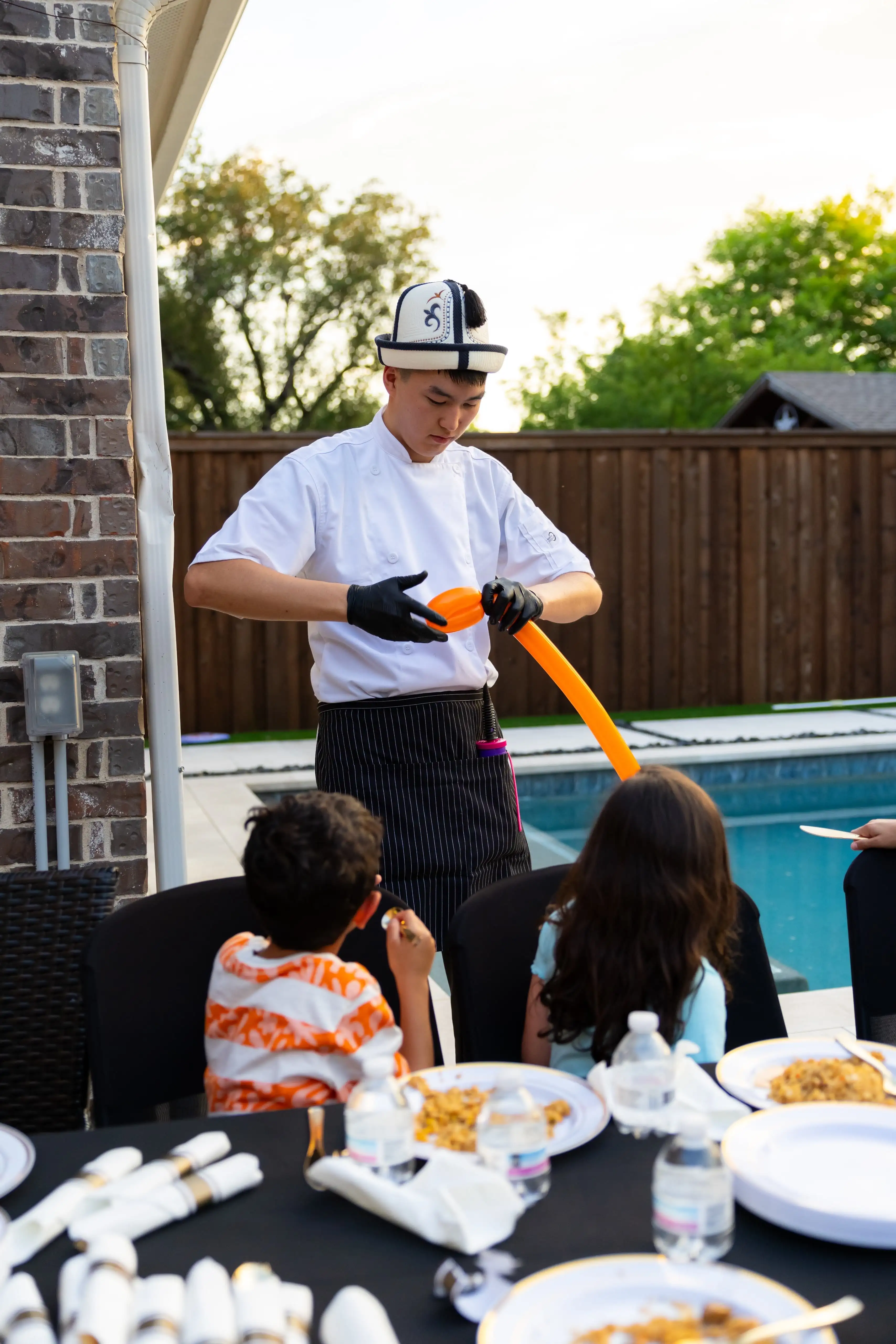 Master chef with traditional hibachi tools and equipment